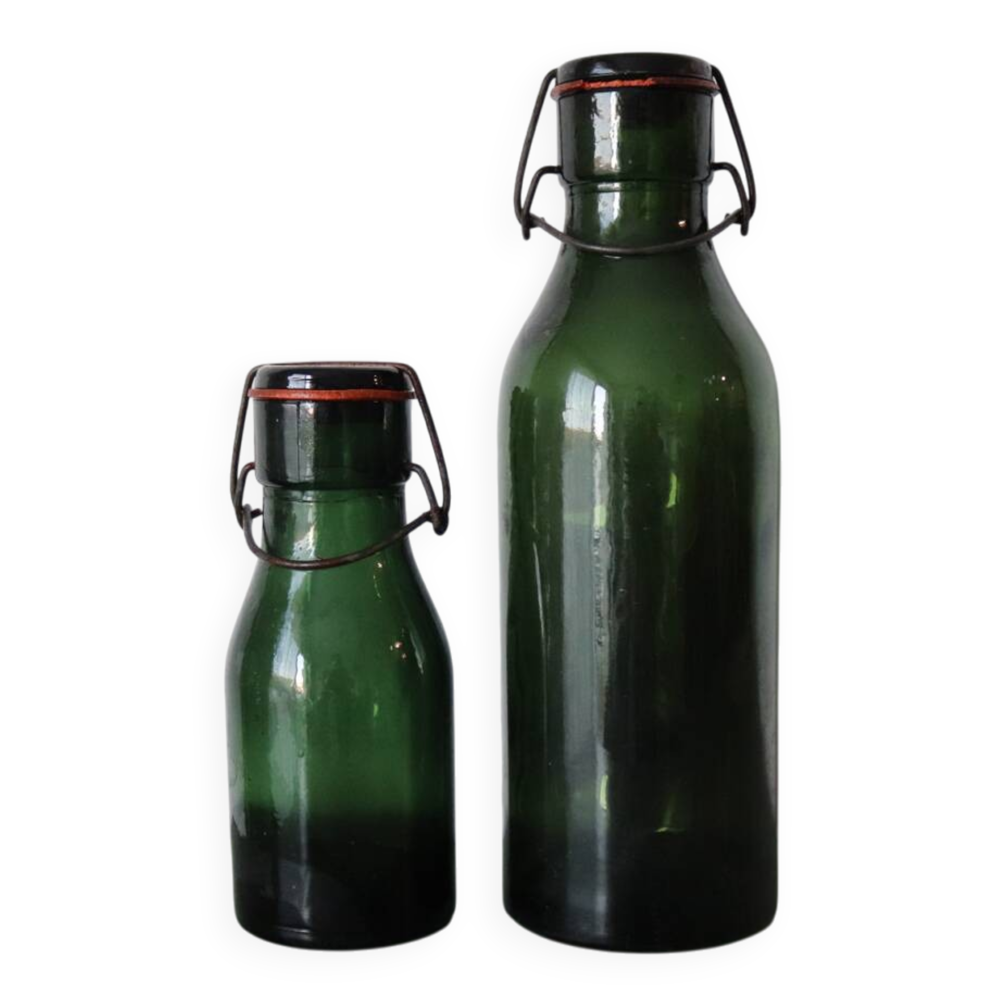 Pair of old green glass jars/bottles – models 1/2 and 1 1/