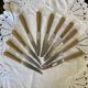 Set of 11 Apollonox table knives in a box