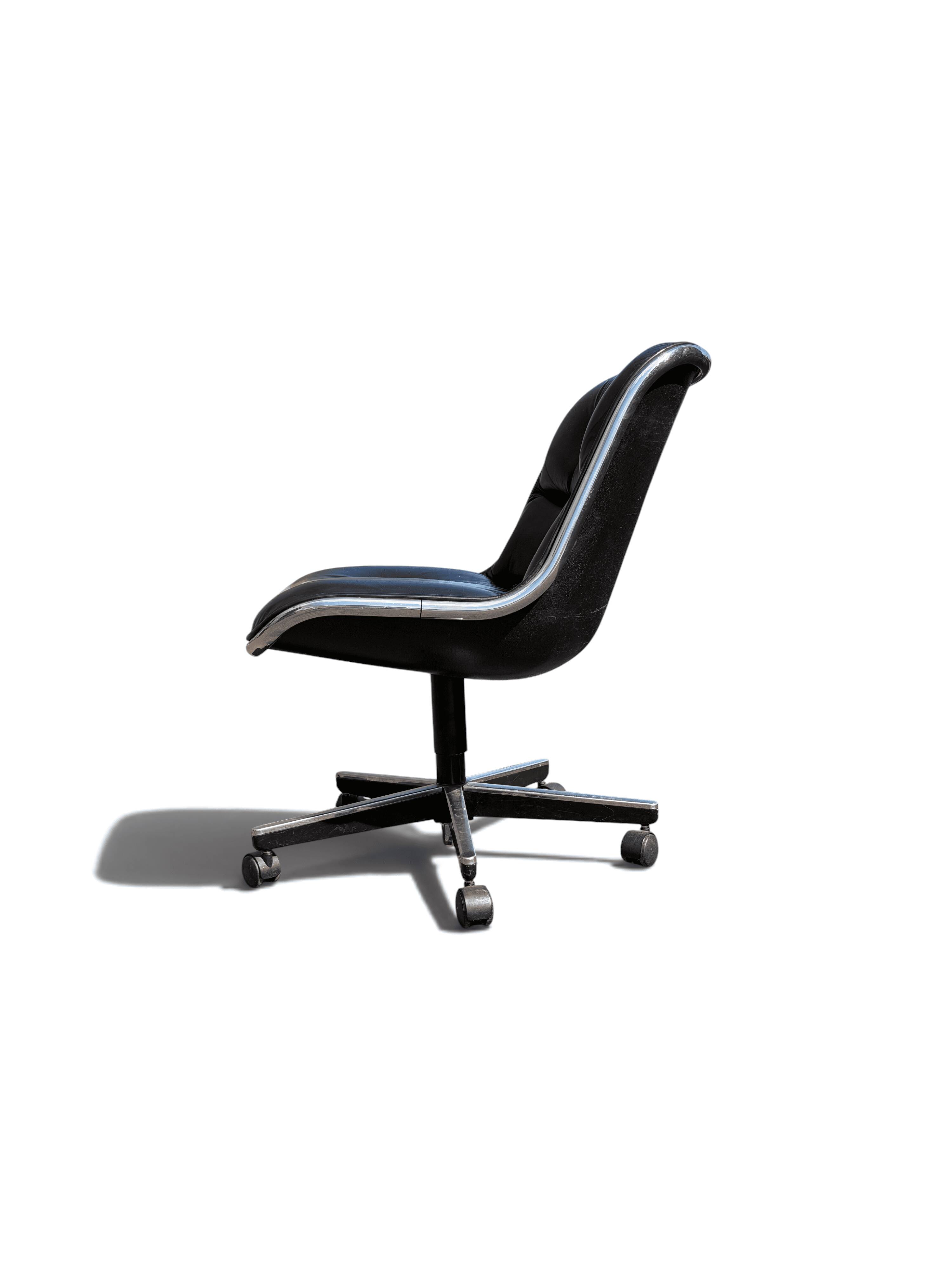 Charles Pollock Knoll office chair in black leather without armrests.