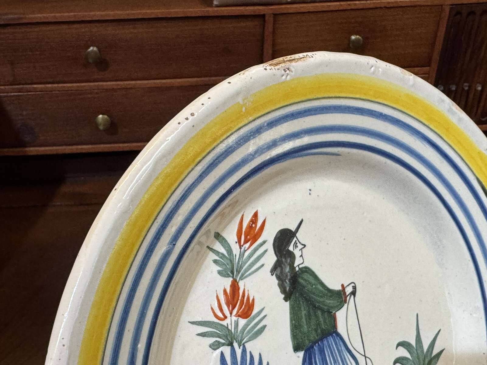 Pair of Quimper earthenware plates from the 1930s.