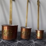 Pots à mesure en cuivre