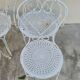 Garden furniture, two armchairs and two wrought iron chairs, period 1