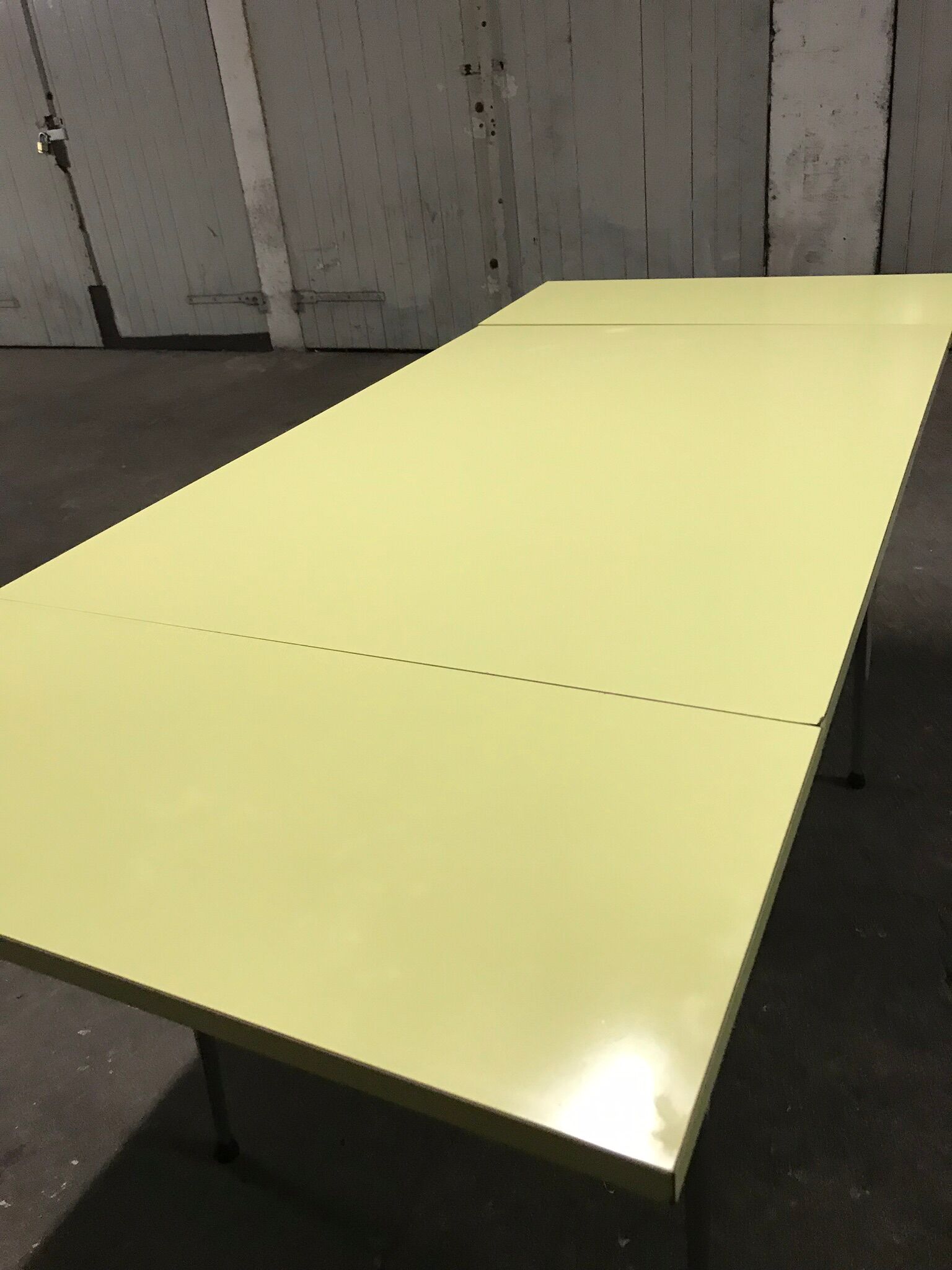 Yellow formica kitchen table with two extension cord, vintage 60s