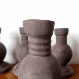 Four vintage handcrafted candle holders