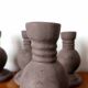 Four vintage handcrafted candle holders