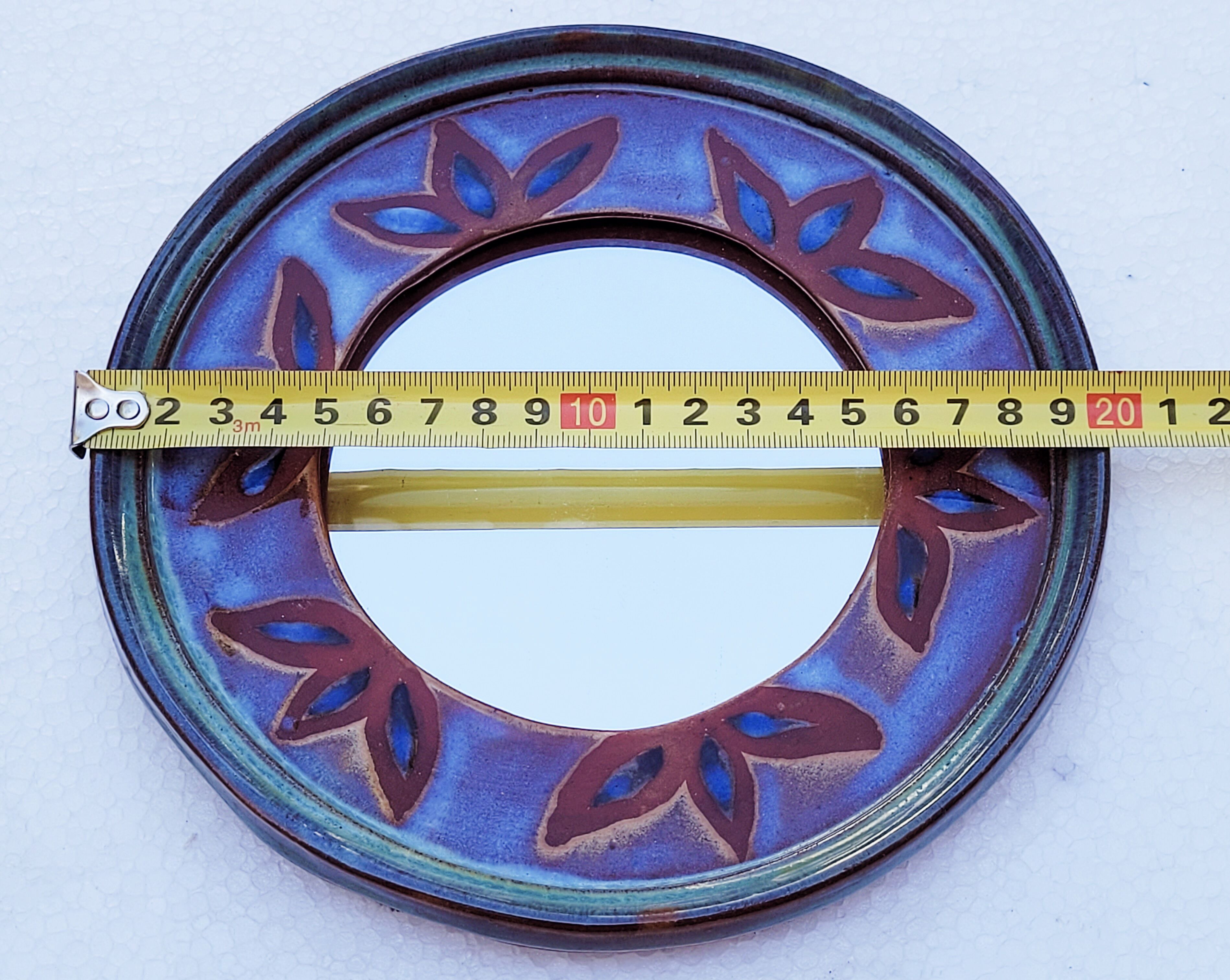 Vintage ceramic mirror dequeker