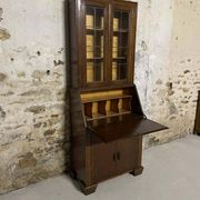 Oak display secretary cabinet with drop-down front, two sections.