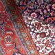 1940s vintage wool medallion rug, red and navy, 206 × 320 cm