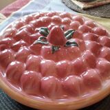 Glazed ceramic dessert plate with strawberry design.