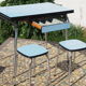 Blue formica table and two stools