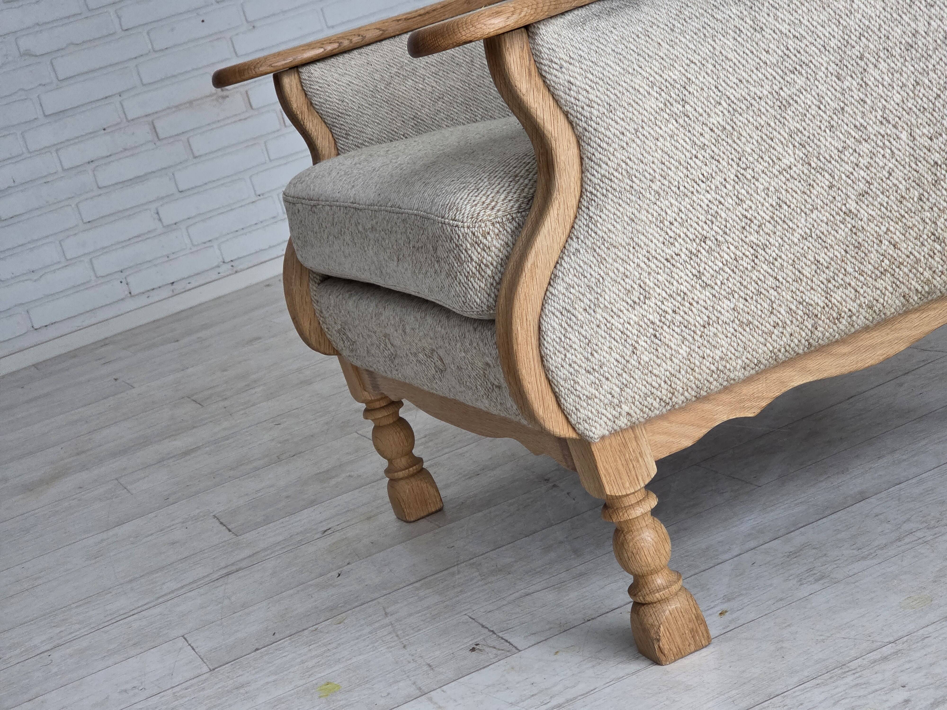 1970s, Danish highback armchair, furniture wool, solid oak wood.