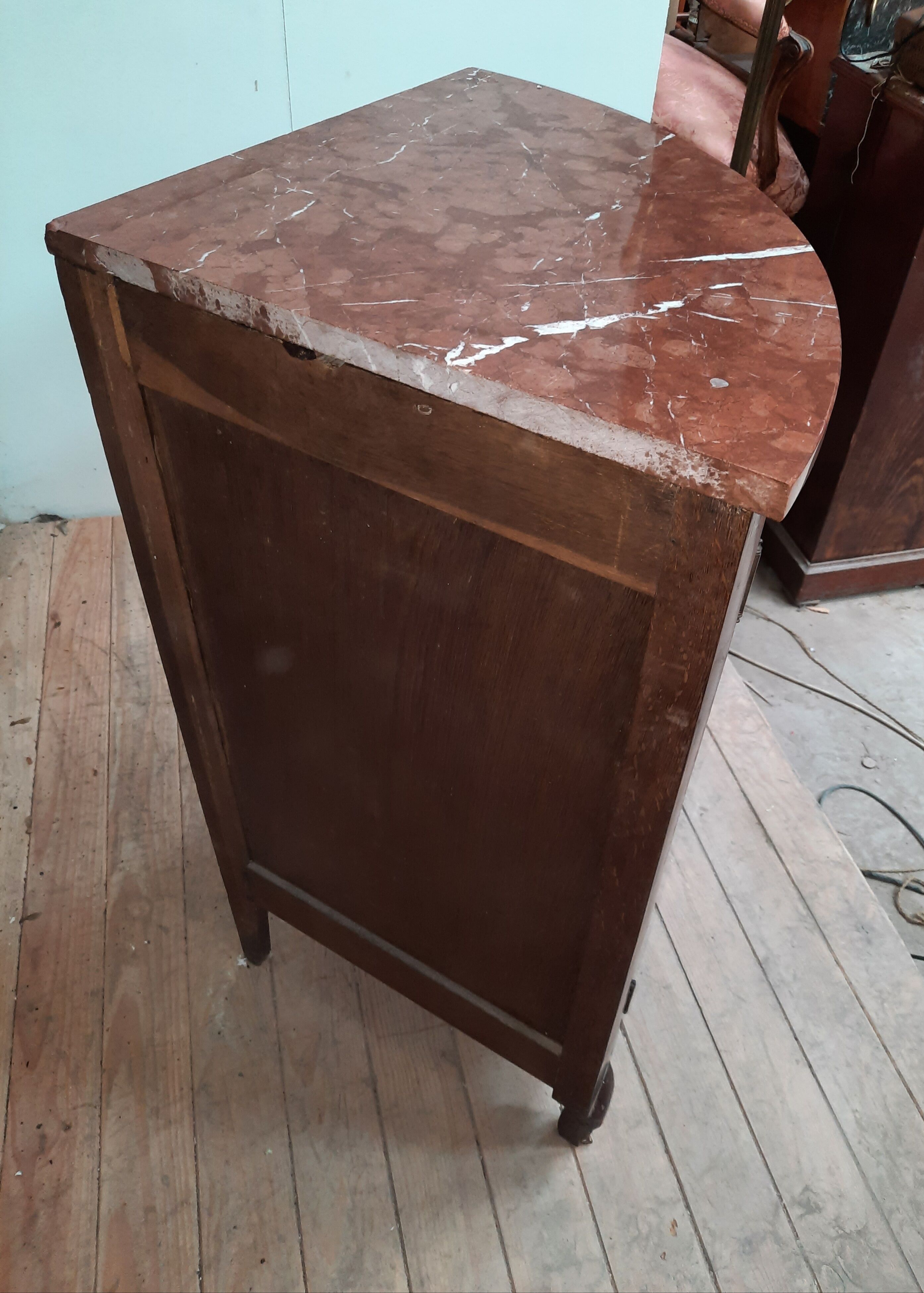 Corner cabinet with marble top