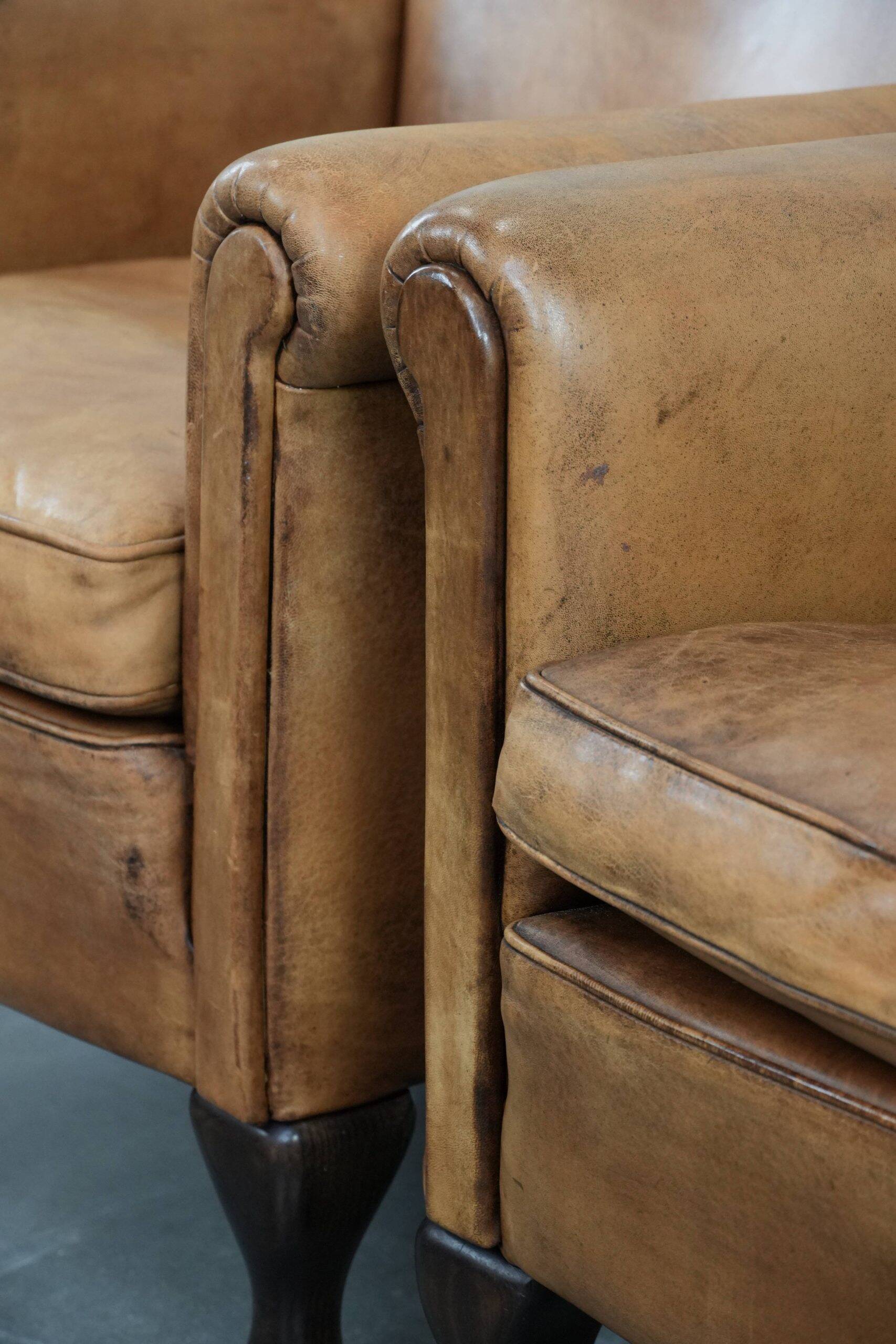 2 fauteuils vintage en cuir de mouton