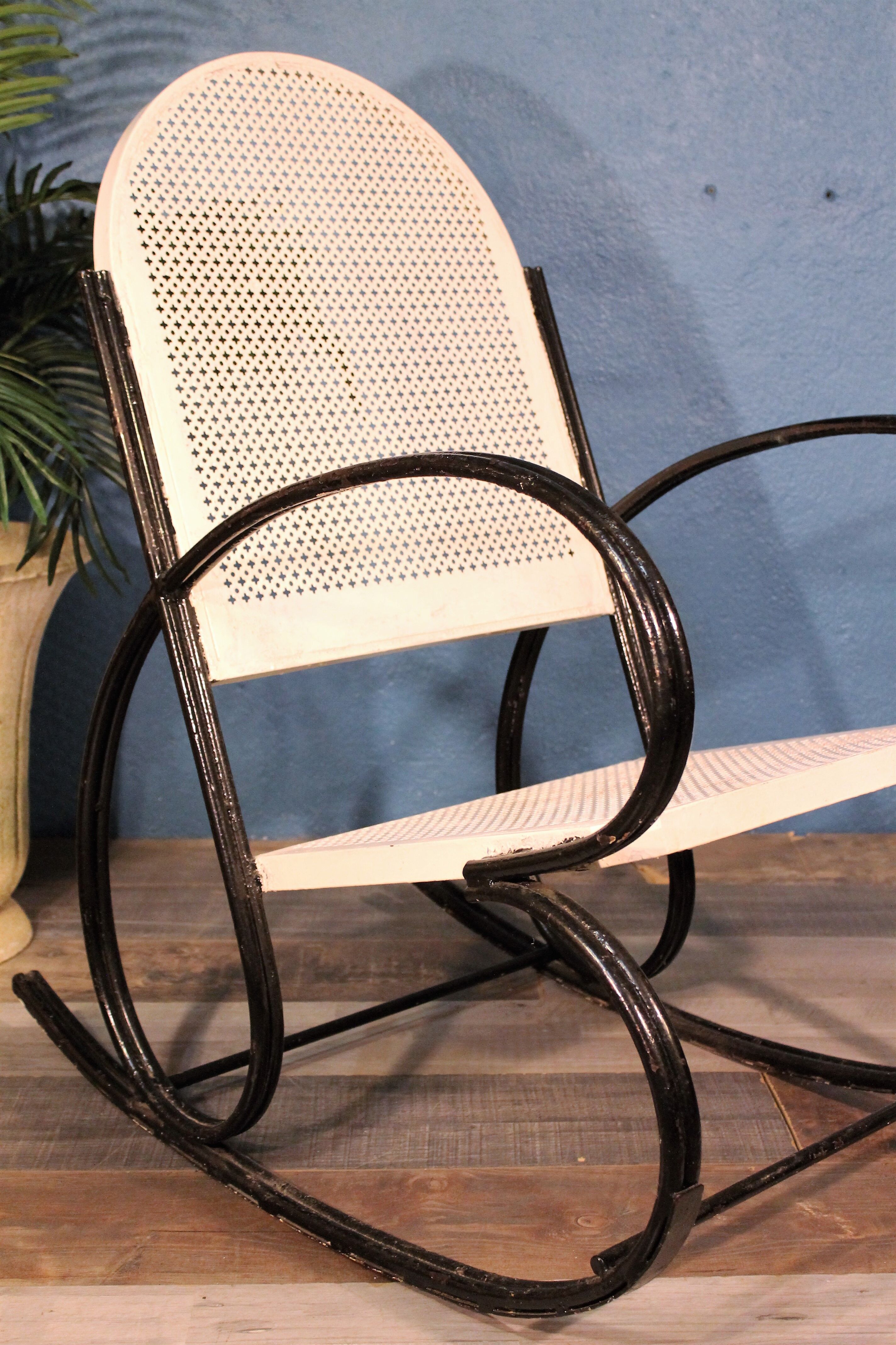 1950s perforated metal rocking chair