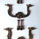 Antique pair of bronze drawer handles.