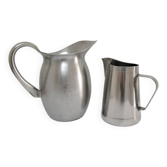 Two vintage Vollrath Hallins stainless steel pitchers