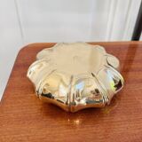 Golden brass ashtray with bamboo decoration.