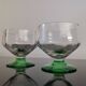 2 faceted champagne glasses with green feet, 1930s