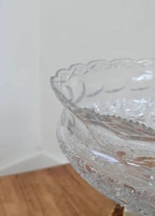 Cut crystal bowl on a brass base in bohemian style.