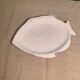 Serving dish in the shape of a white glazed ceramic fish