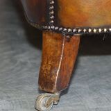 Pair of leather Chesterfield sofas by Howard & Sons