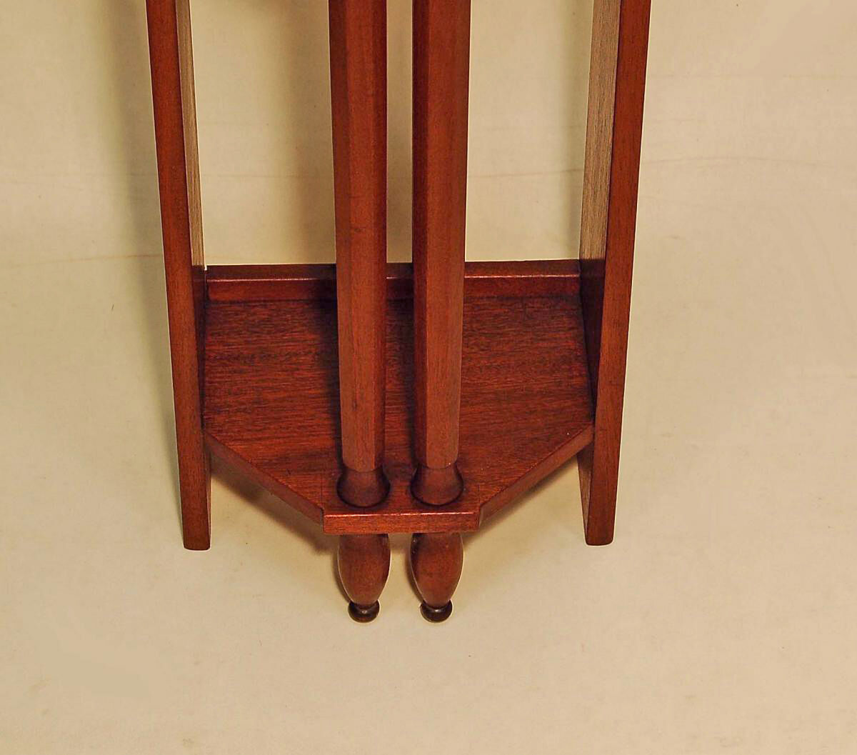 Pair of art deco mahogany wall columns