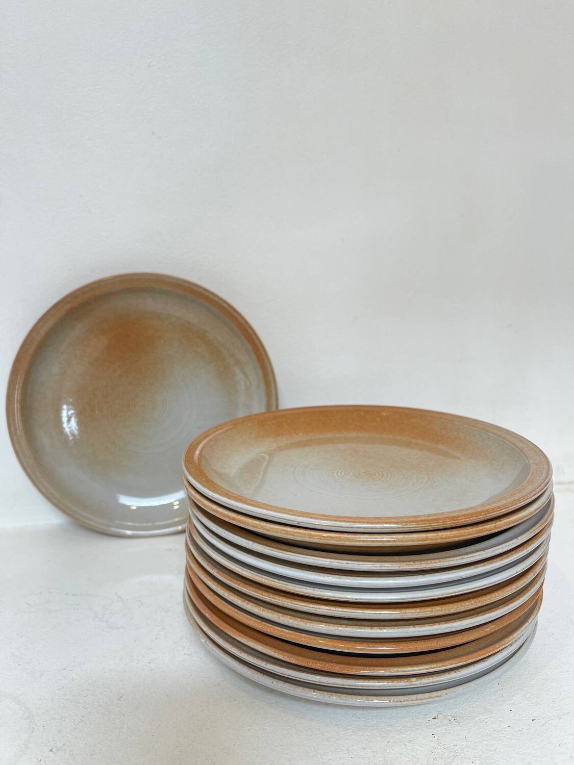 12 stoneware dessert plates, 1970