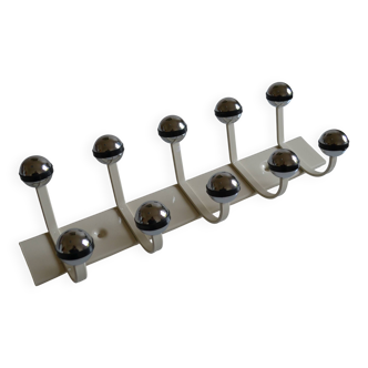 Vintage 1970s wall-mounted coat rack with 10 hooks