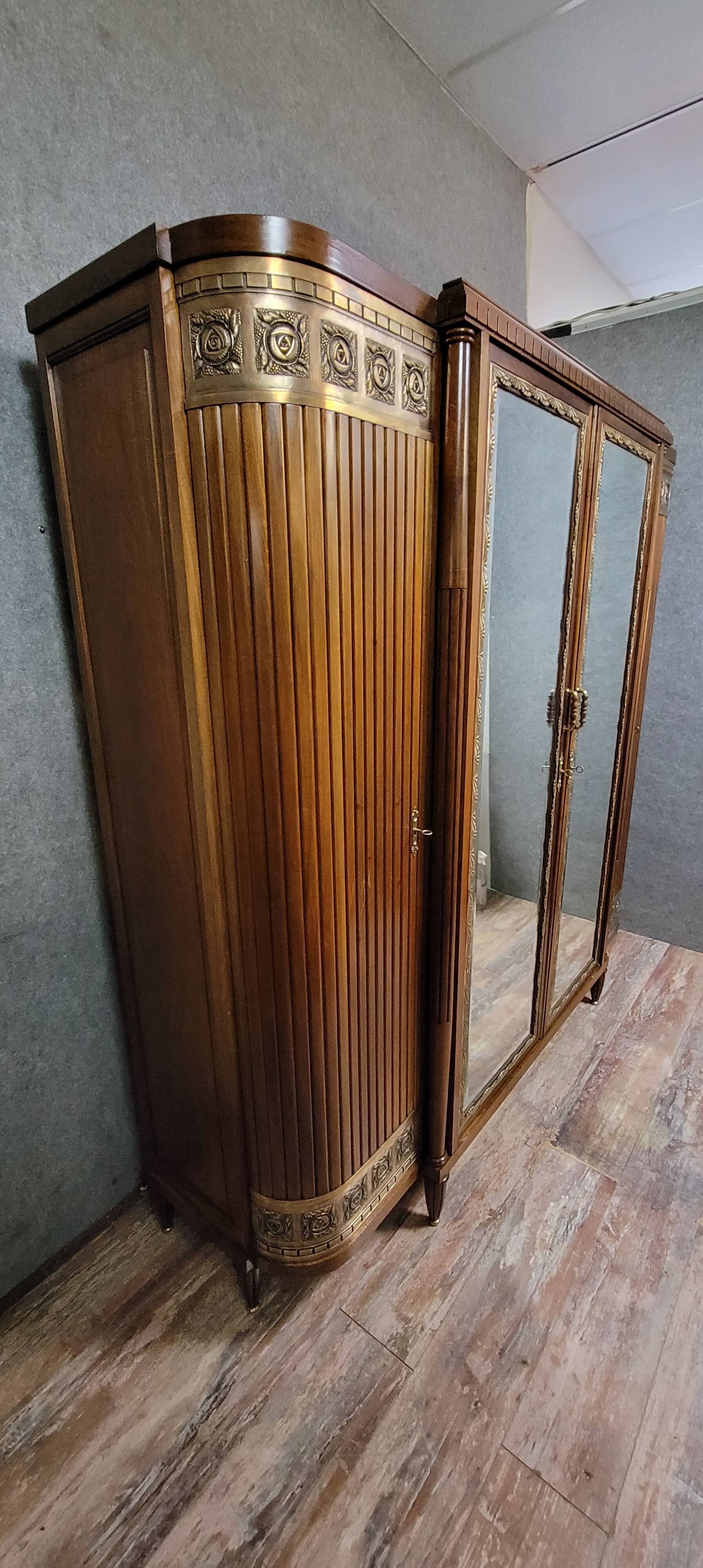 Large Art Deco bookcase wardrobe in mahogany and bronze.