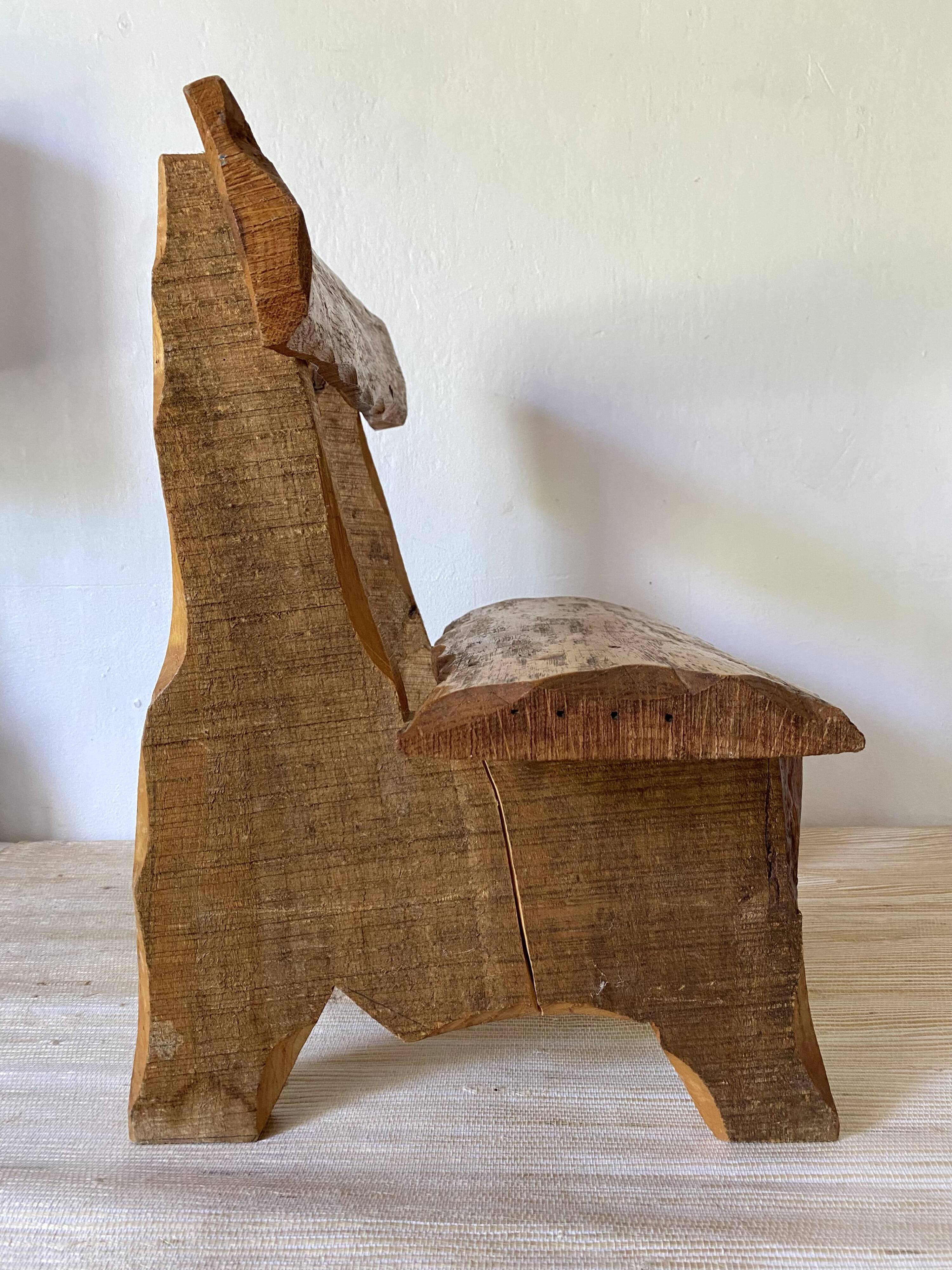 Brutalist low chair in solid wood