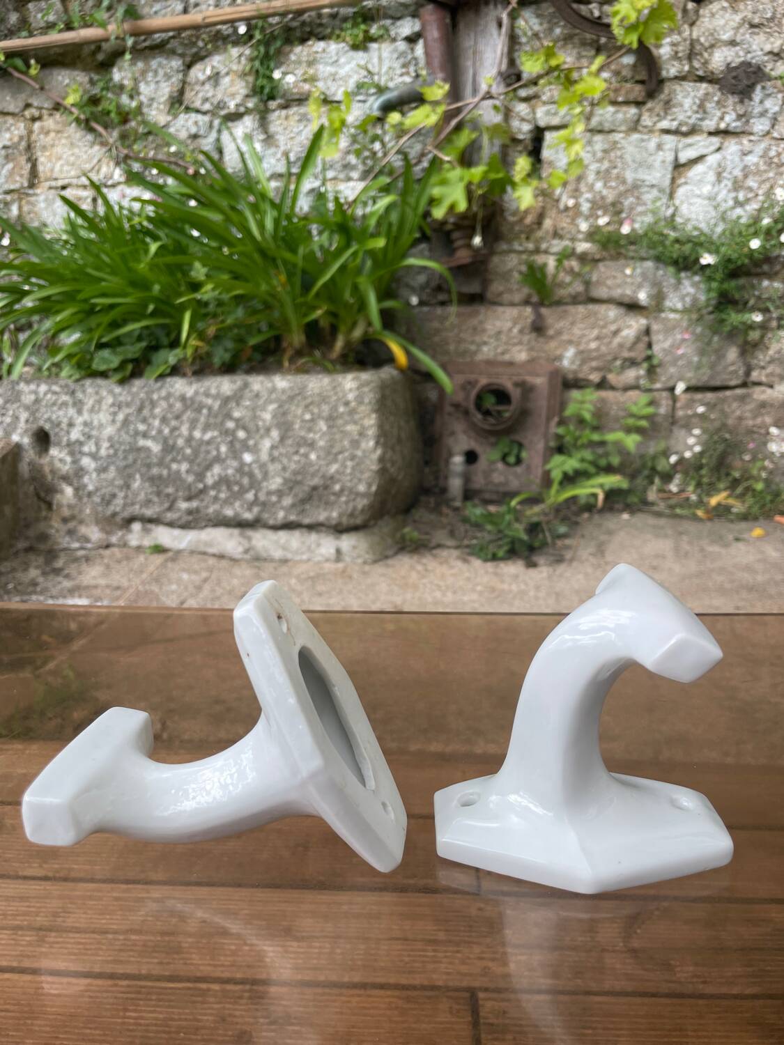 Duo of porcelain hooks