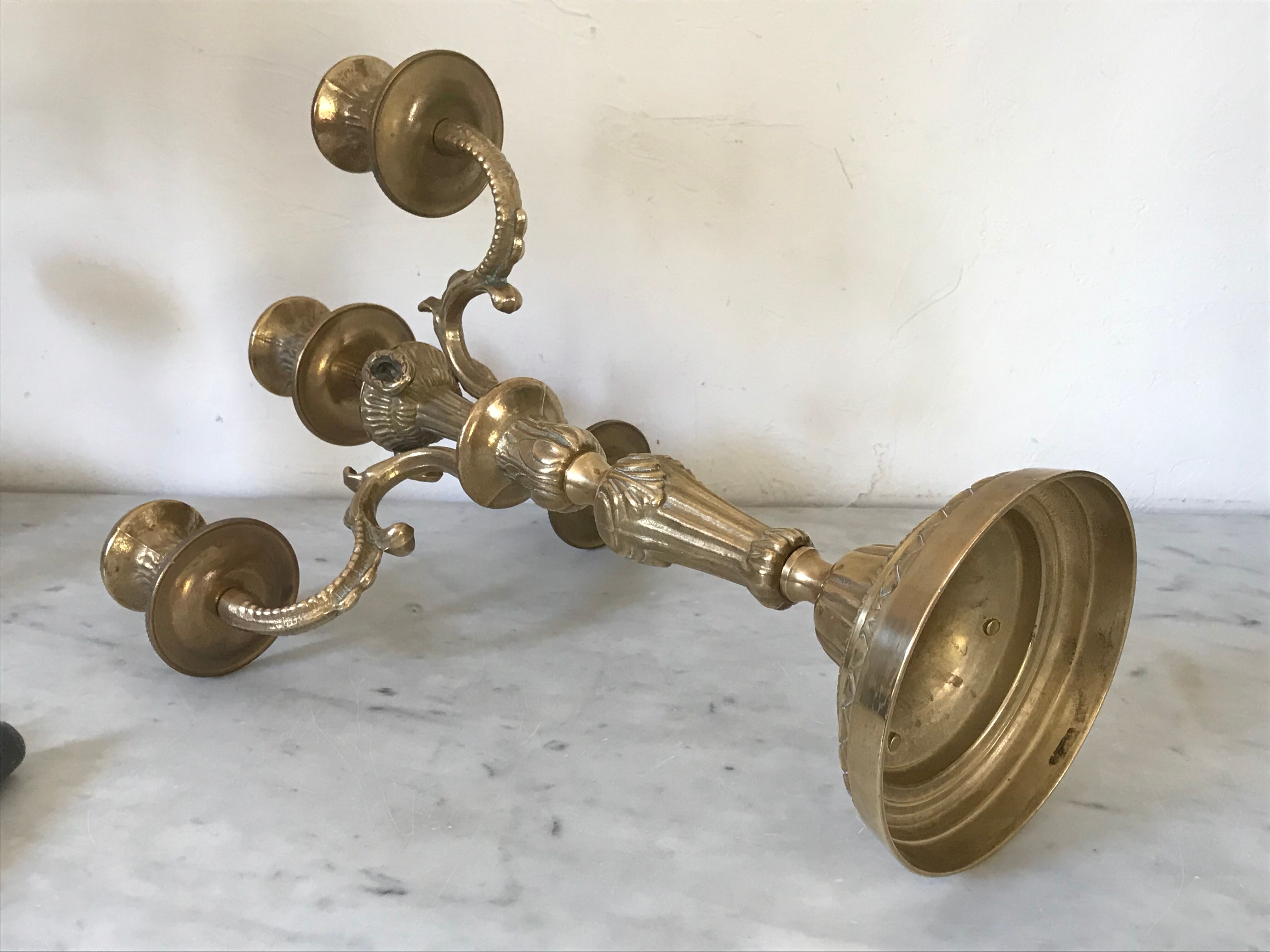 Pair of golden bronze candlesticks