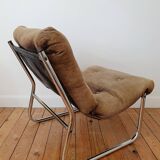 Vintage tubular chrome and velvet armchair
