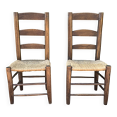 Pair of handcrafted rush chairs in solid oak.