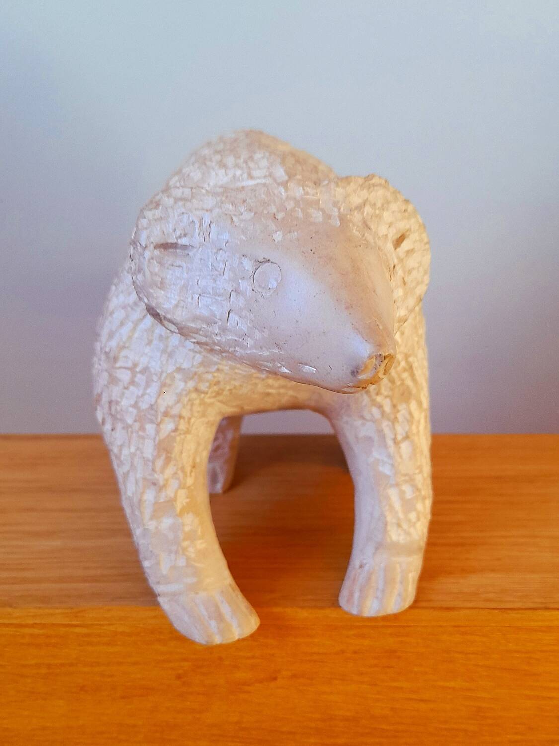 Stone bear sculpture, folk art