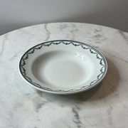 Set of 12 deep plates Saint Amand with floral garland decoration.