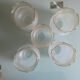 Set of 5 antique frosted glass lampshades with gold trim in Art Deco style
