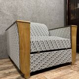 tulip armchair convertible into a bed, Art Deco period, light wood