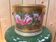 Cache-pot porcelain from Paris, rose decoration on a golden background, Empire style.