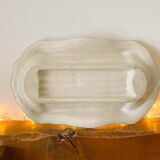 Plate of asparagus with a sauce.