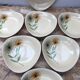 Set of 7 antique St. Clement Sirius pattern ceramic plates