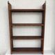 Large shelf wall in wood with friezes