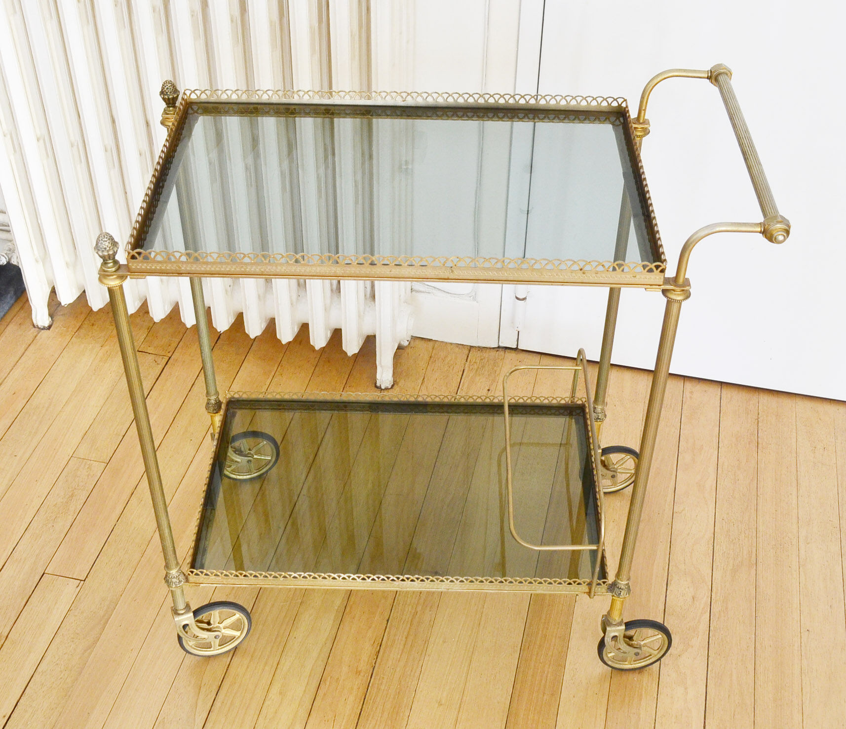 Glass and gold metal wheeled serving table 1960