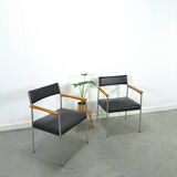 Chaises DDR avec base chromée et revêtement noir, chaises de salle à manger