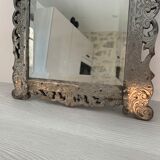 Eventful beveled mirror and openwork period 1900 repelled tin decoration