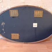 Oval Art Deco mirror with vintage chrome frame from the 1970s.