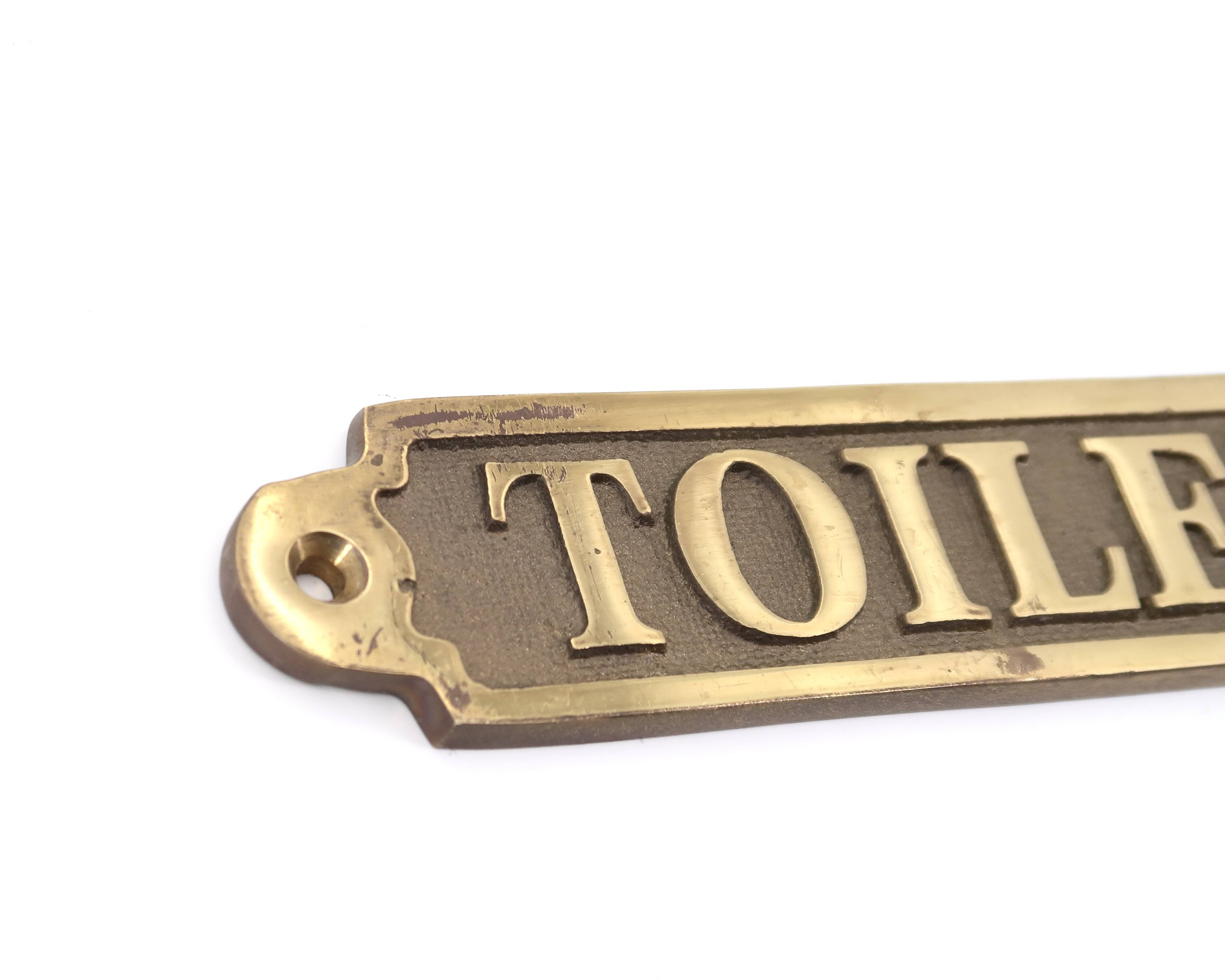 Toilet brass door plaque, 1970s