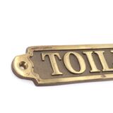 Toilet brass door plaque, 1970s