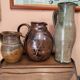 Set of three vintage ceramic jugs and a pitcher.