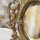 Miroir en bronze à décor d'angelots et mascarons fin 19ème siècle